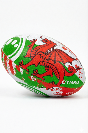 White, green and red Optimum Wales rugby ball with red dragon and CYMRU print, angled on white - Optimum