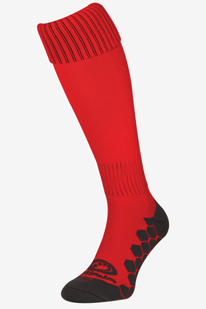 Single red Classico football sock, side view with black hexagonal grip sole on white - Optimum
