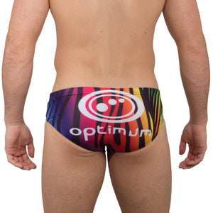 Rainbow zebra print Optimum tackle trunks, rear view on model with white halftone logo and Optimum text - Optimum