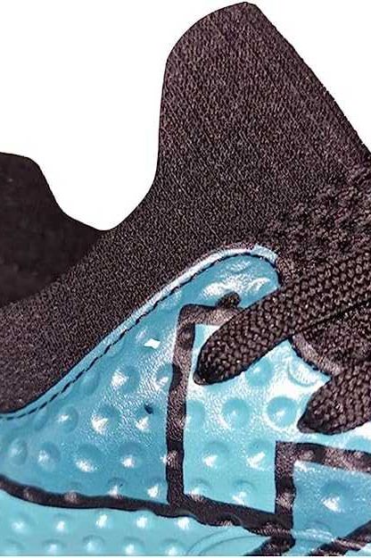 Close-up detail of the knit collar and toe box texture on the Aztec rugby boot