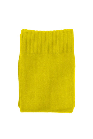 Single pair of yellow Classico knee-length football socks, folded, on white - Optimum