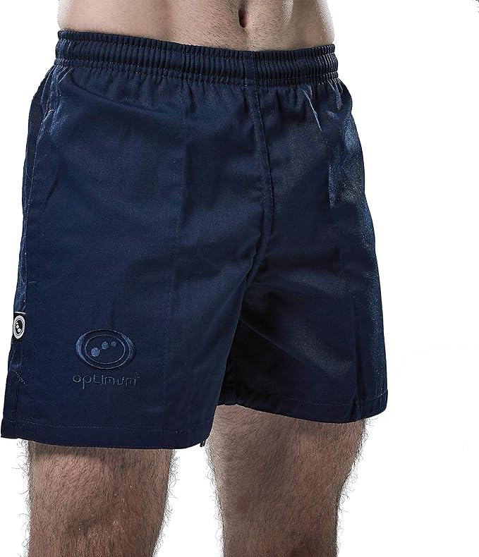 Man wearing navy Optimum Auckland rugby shorts, angled front view with tonal logo, on white - Optimum