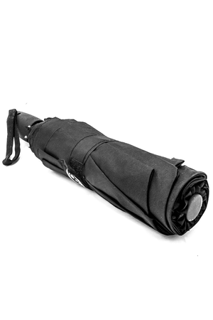 Folded black Optimum compact umbrella with wrist strap and grip handle, lying on white - Optimum