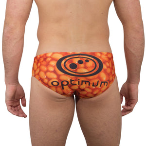 Optimum Tackle Trunks swim brief in orange baked beans print, rear view on male model with black Optimum logo - Optimum