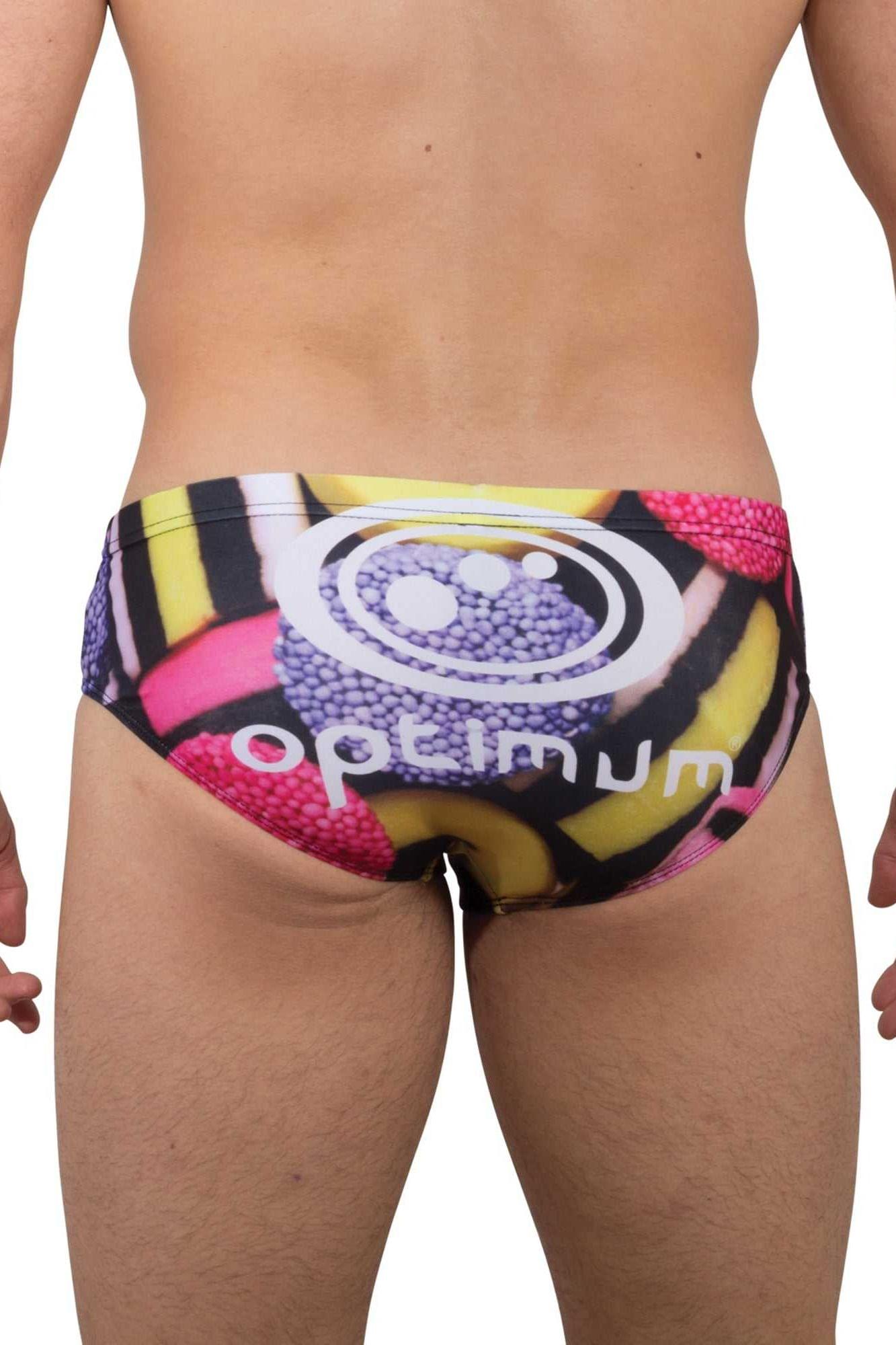 Optimum Tackle Trunks swim brief in liquorice allsorts print, rear view on male model with white Optimum logo - Optimum