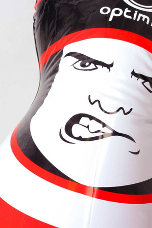 Close-up of red Optimum inflatable tackle buddy's snarling printed face and black scrum cap - Optimum