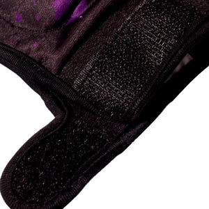 Close-up of black Optimum Fusion hockey glove Velcro cuff with purple splatter print, on white - Optimum
