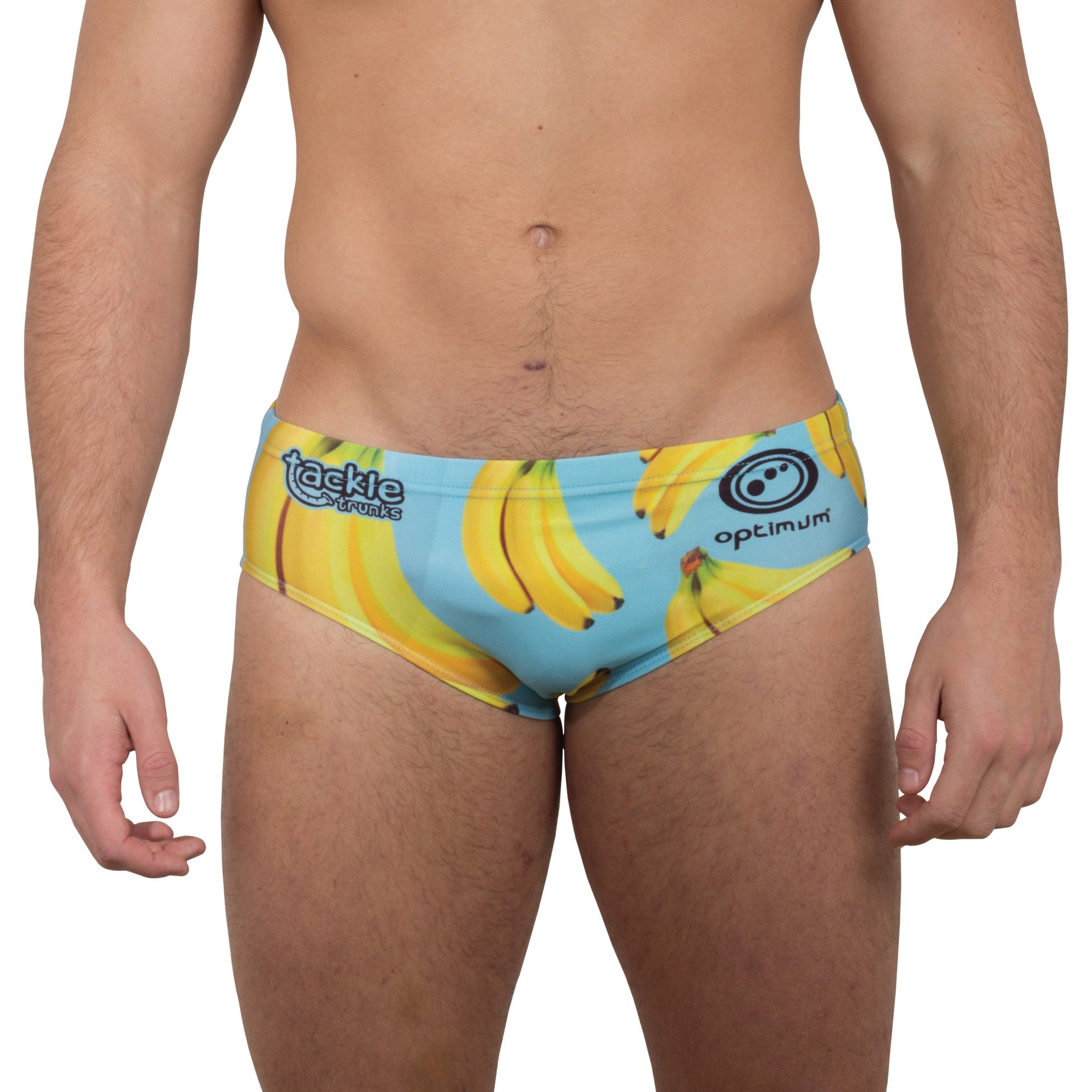 Optimum Tackle Trunks swim brief in banana print on blue, front view on male model with tackle trunks logo - Optimum