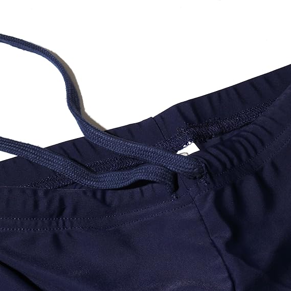 Close-up of navy Optimum Multi-X shorts waistband with drawstring, on white - Optimum