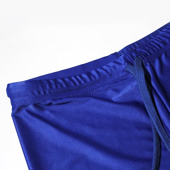 Close-up of royal blue Optimum Multi-X shorts elasticated waistband corner, on white - Optimum