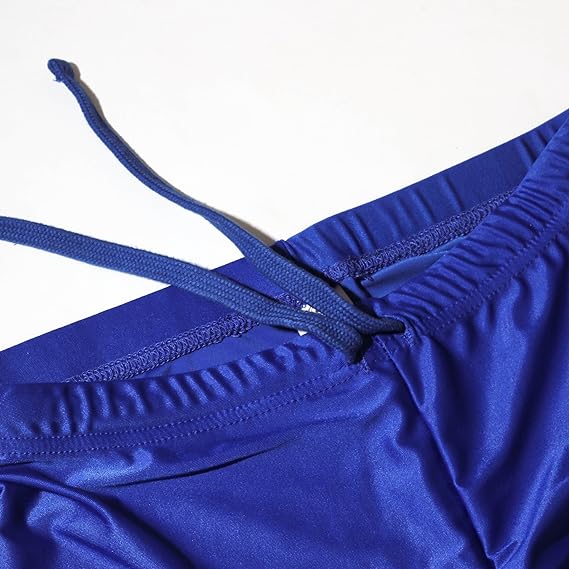 Close-up of royal blue Optimum Multi-X shorts waistband with drawstring, on white - Optimum
