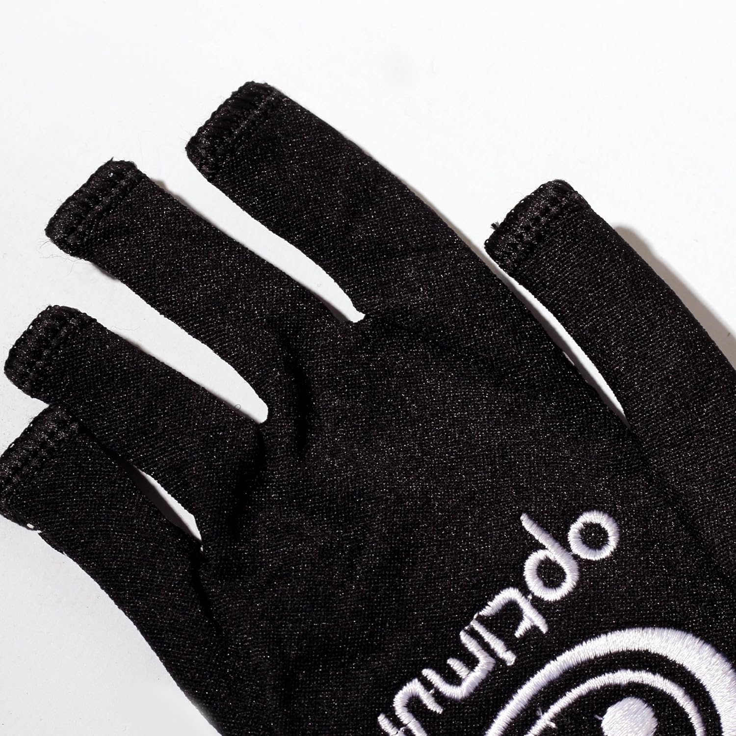 Close-up of black Optimum Stik Mits fingerless glove showing cut-off fingertips and white logo on white - Optimum