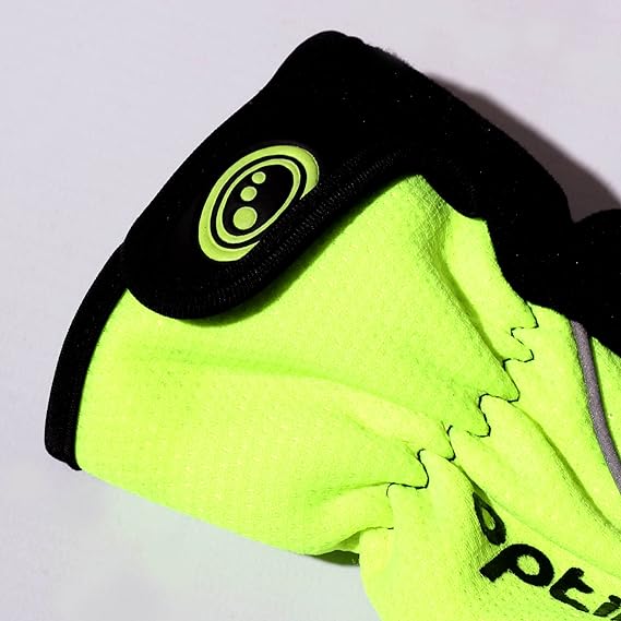 Close-up of fluorescent yellow winter glove cuff with black hook-and-loop wrist strap and logo badge - Optimum