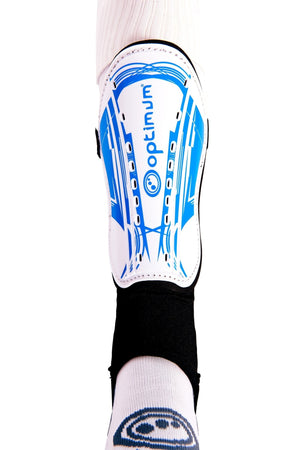 White Optimum Velocidade shin guard with blue print and logo worn over white sock, front view on white - Optimum