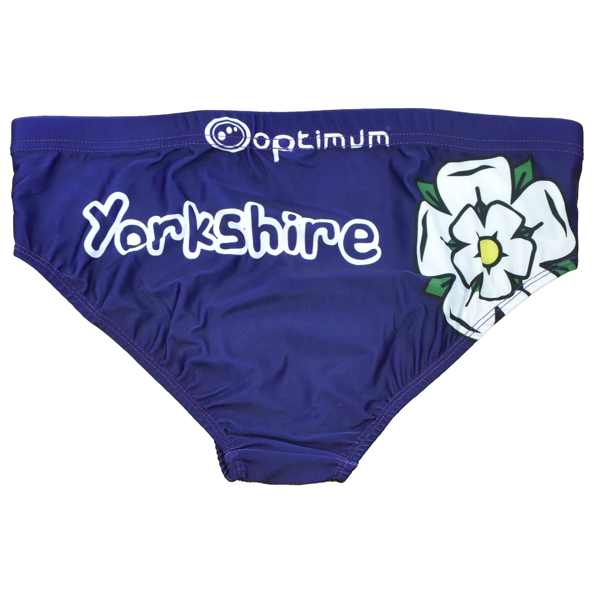 Navy Optimum Yorkshire tackle trunks with white logo, text and white rose print, flat lay - Optimum